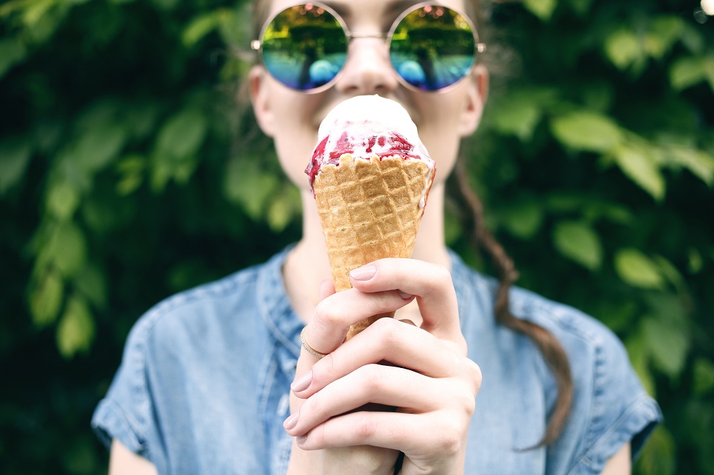 Girl Holding an Ice Cream on a Cone